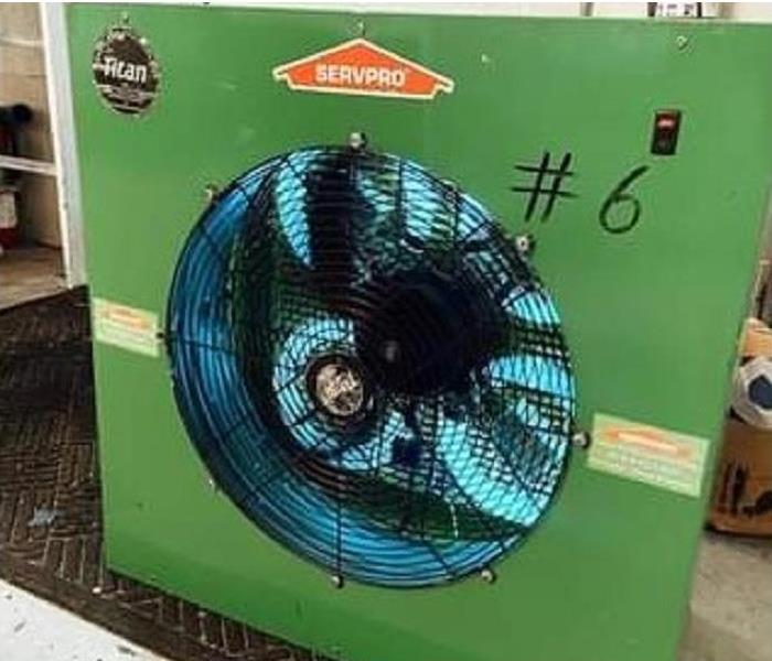 A large fan with microbe fighting UV lights inside.